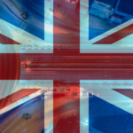A british flag over traffic