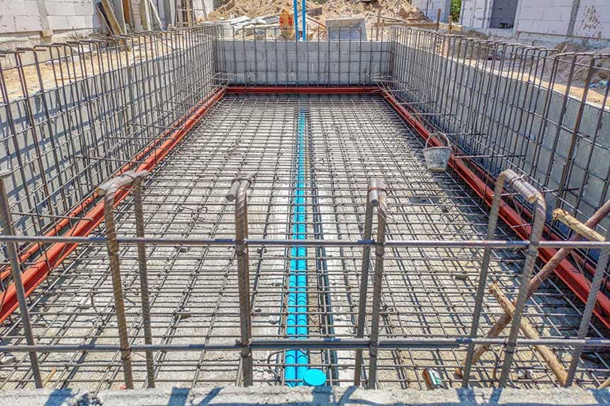 concrete wireframe with exposed popes built with shotcrete foundation